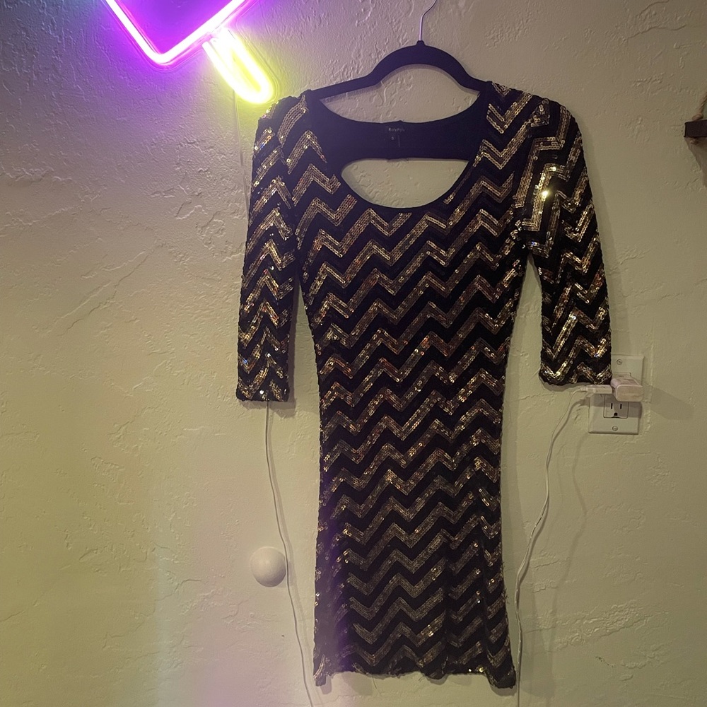 Black and gold sequin dress